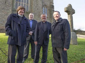Local clergy in front of the old cross
