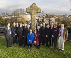 Politicans, museum staff and clergy, just prior to the removal of the old cross